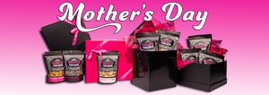 Banner with words Mothers Day appearing above four pink and black gift boxes. Bags of gourmet popcorn appear in front of and in the gift boxes.