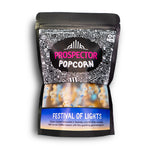 A bag of Festival of Lights gourmet Prospector Popcorn sits on a white background