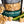 Load image into Gallery viewer, A bag of Jalapeno Cheddar gourmet popcorn sits behind its popcorn, a scooper filled with popcorn, jalapeños, and cheddar cheese wedges.
