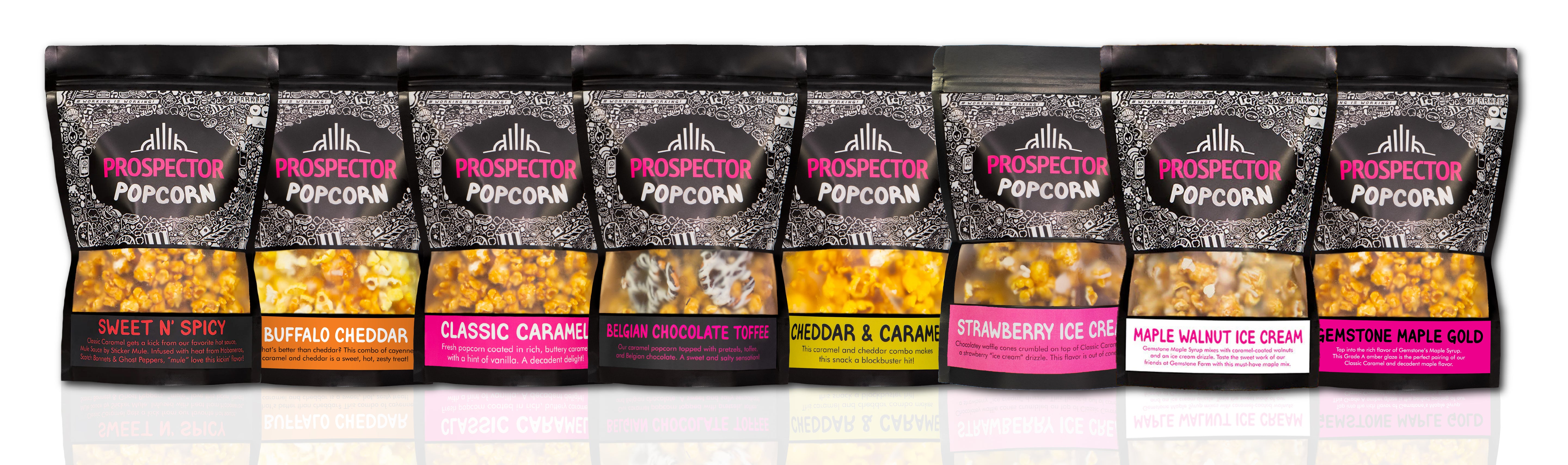 Eight bags of Prospector Popcorn is a row with eight different flavors on a white background