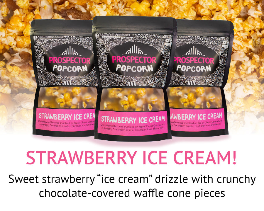 Bags of Prospecto Popcorn labeled "Strawberry Ice Cream" are shown in front of a background of popcorn with chocolate pieces. Text describes a strawberry drizzle with crunchy chocolate-covered waffle cone pieces.