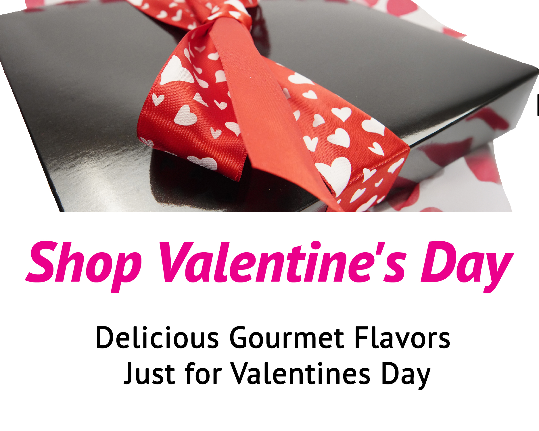 A black gift box with a red ribbon adorned with white hearts is displayed. The text reads "Shop Valentine's Day" in pink and "Delicious Gourmet Flavors Just for Valentines Day" in black.