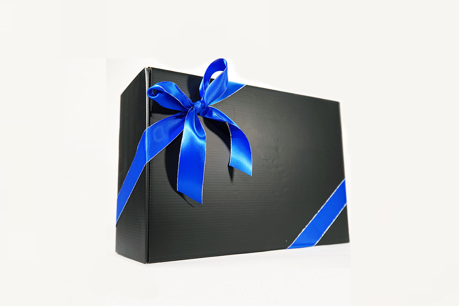 A black gift box adorned with a shiny blue ribbon and bow, set against a plain white background.